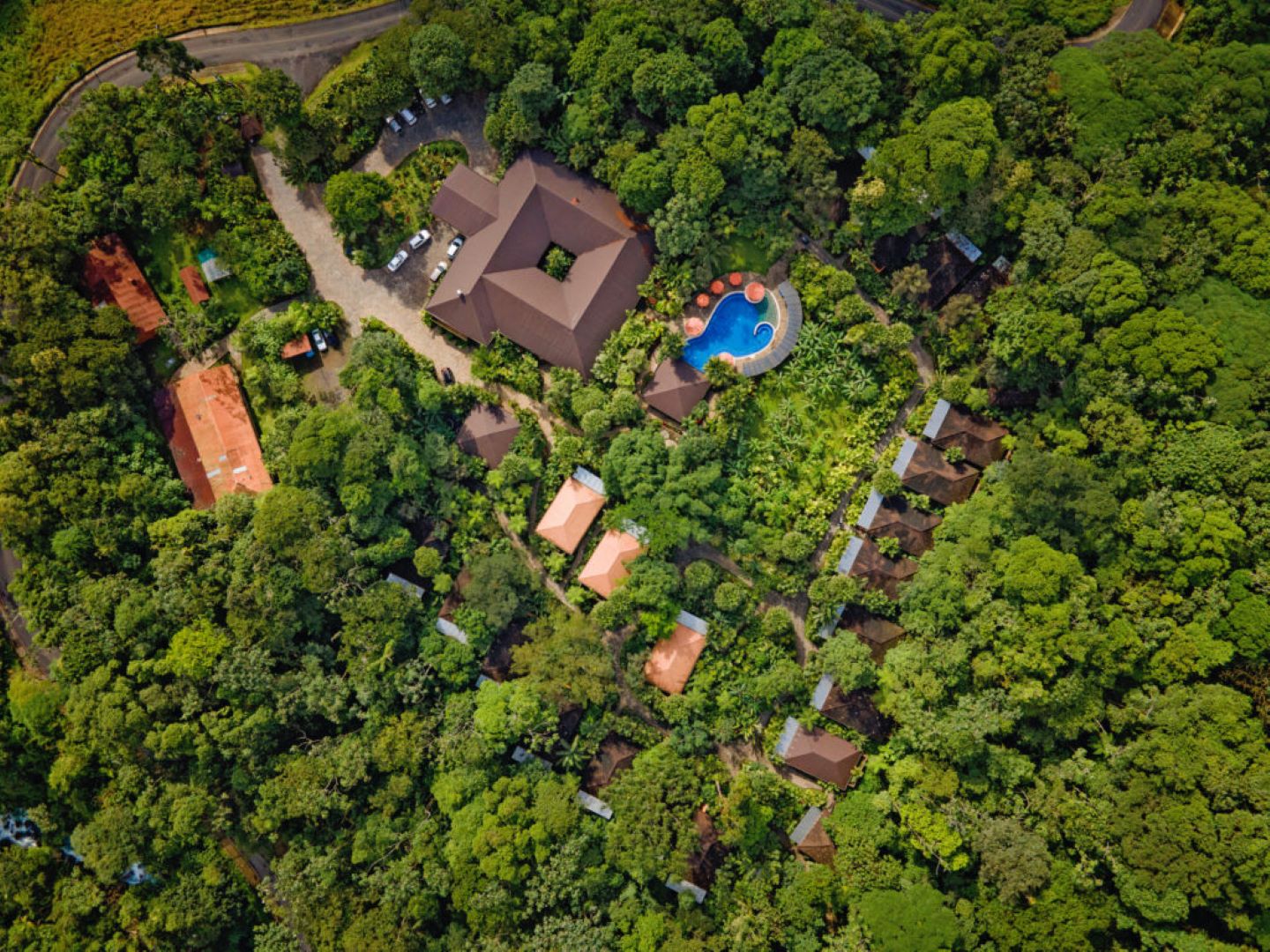 Top-down aerial view of Río Celeste Hideaway Hotel and jungle landscape