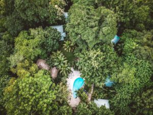 Aerial view of Copal Tree Lodge nestled in the Belizean jungle near the Caribbean coast