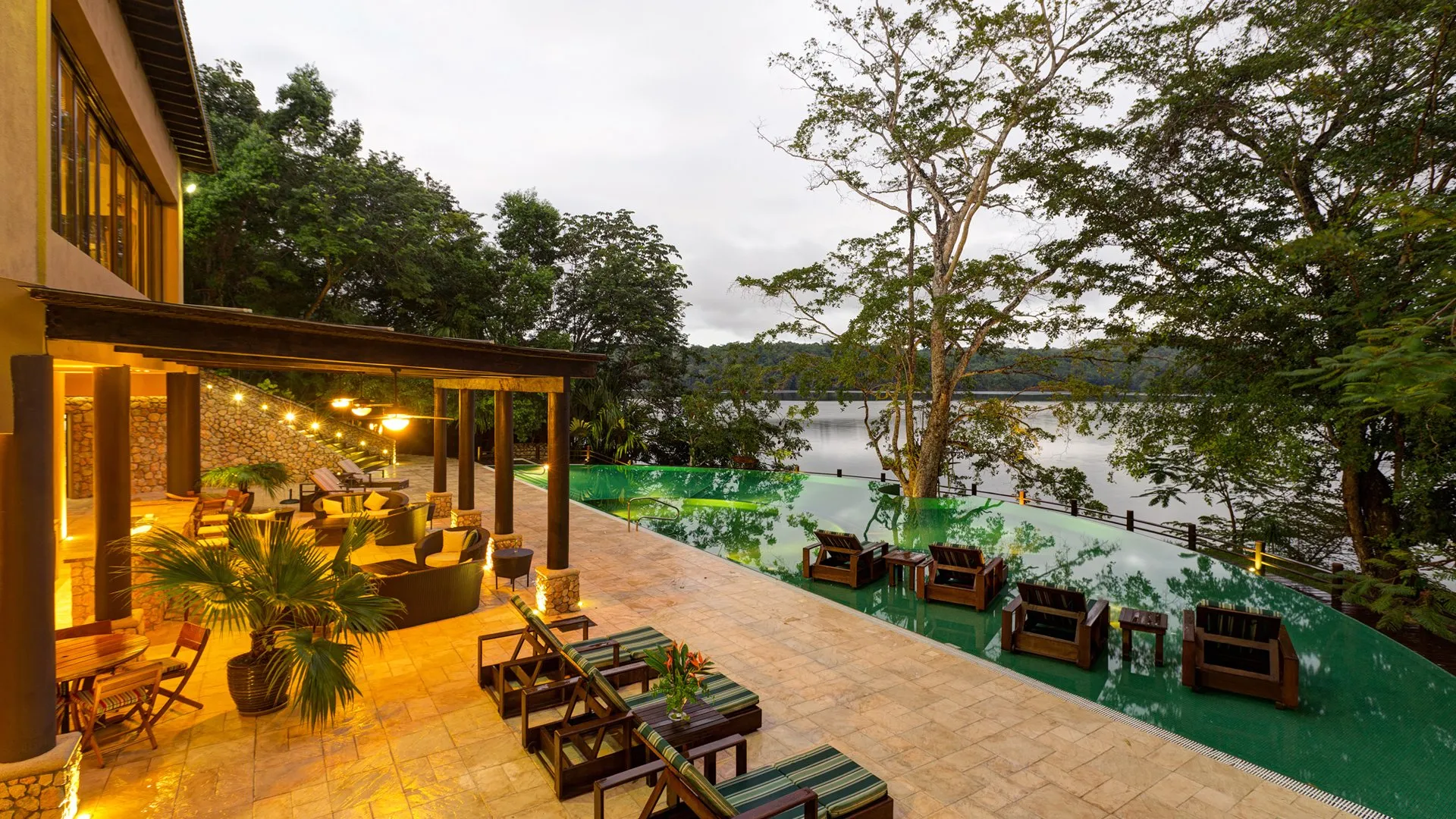 Interior of a lakeside suite with balcony at Las Lagunas